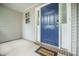 Welcoming front porch with a blue front door and a 'Welcome' doormat at 5406 Woodbreeze Dr, North Charleston, SC 29420