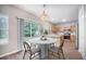 Cozy kitchen with modern lighting, stainless appliances and a view to the outside, perfect for casual dining at 5406 Woodbreeze Dr, North Charleston, SC 29420
