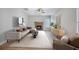 Comfortable living room features a fireplace, sofa, rug and modern decor at 5406 Woodbreeze Dr, North Charleston, SC 29420