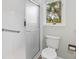 Bright bathroom featuring a glass-enclosed shower, white subway tile, and a window offering an outdoor view at 55 Fairway Dunes Ln # Week 2, Isle of Palms, SC 29451