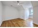 Spacious bedroom with hardwood floors, a ceiling fan, natural light, and a bonus alcove at 5625 Crystal Harbor Ln, Hollywood, SC 29449