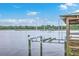 Dock with boat lift overlooking tranquil water and marsh views at 5625 Crystal Harbor Ln, Hollywood, SC 29449
