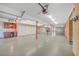 Spacious garage includes a wet bar, multiple storage closets, high ceilings, and room for many cars or storage at 5625 Crystal Harbor Ln, Hollywood, SC 29449