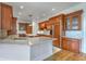 Modern kitchen showcasing custom cabinets, marble countertops and stainless steel appliances at 5625 Crystal Harbor Ln, Hollywood, SC 29449