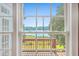 A beautiful marsh and water view framed by a large window gives the home natural light and scenic ambiance at 5625 Crystal Harbor Ln, Hollywood, SC 29449