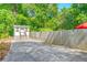 Backyard featuring a shed and wood fence, providing a private outdoor space at 672 W Oak Forest Dr, Charleston, SC 29407