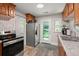 Kitchen with stainless steel appliances and wood cabinets at 672 W Oak Forest Dr, Charleston, SC 29407