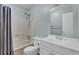 Standard bathroom with tub and shower featuring a bright white vanity and commode at 807 Greencastle Dr, Goose Creek, SC 29445