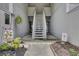 Charming condo entrance with stairs and walkway leading to the front door at 807 Greencastle Dr, Goose Creek, SC 29445