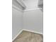 A walk in closet features neutral walls, shelves, and carpeted flooring at 807 Greencastle Dr, Goose Creek, SC 29445
