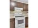 Kitchen with modern white range, tile backsplash, and ample countertop space at 807 Greencastle Dr, Goose Creek, SC 29445