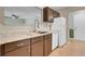 Bright kitchen featuring stainless steel appliances, white countertops, and dark cabinets at 807 Greencastle Dr, Goose Creek, SC 29445
