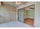 Screened in patio with slider door access to the home's interior with ceiling fan overhead at 807 Greencastle Dr, Goose Creek, SC 29445