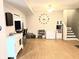Finished basement featuring a bar area, updated flooring, and a ceiling fan at 9489 Sidneys Rd, Round O, SC 29474