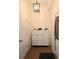Bright entryway with shoe cabinet and pendant lighting offers a welcoming space at 9489 Sidneys Rd, Round O, SC 29474