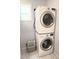 Stackable washing machine and dryer in a laundry room at 9489 Sidneys Rd, Round O, SC 29474