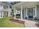 Inviting front porch with landscaping, offering curb appeal at 9624 Scarborough Ct, Summerville, SC 29485