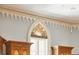Decorative architrave featuring stained glass inset with custom woodwork at N Blvd, Mount Pleasant, SC 29464