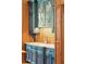 Stylish butler's pantry with blue cabinetry, decorative glass, and countertops at N Blvd, Mount Pleasant, SC 29464