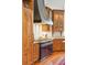 Gourmet kitchen featuring wood cabinets, a chef's range, and modern appliances for culinary enthusiasts at N Blvd, Mount Pleasant, SC 29464