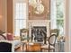 Charming living room showcasing a chandelier, fireplace, and comfortable seating creating a warm ambiance at N Blvd, Mount Pleasant, SC 29464