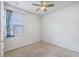 Bedroom featuring a ceiling fan and a window with a decorative curtain at 1003 Peridote Way, Ladson, SC 29456