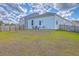 View of fenced yard with small patio and seating area at 1011 Peridote Way, Ladson, SC 29456
