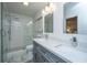 Modern bathroom with double vanity, sleek fixtures, and a glass-enclosed shower, offering a spa-like experience at 1035 Planters Curve, Mount Pleasant, SC 29464