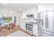 Well-appointed kitchen with stainless steel appliances and an adjacent dining area at 1035 Planters Curve, Mount Pleasant, SC 29464
