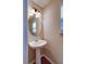 Stylish half bathroom featuring a pedestal sink, updated lighting, and modern fixtures at 1039 Steelechase Ln, Hanahan, SC 29410