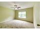 Bedroom featuring neutral carpet, paint, ceiling fan, and natural light at 1039 Steelechase Ln, Hanahan, SC 29410