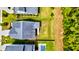 Aerial view of the home showing landscaped yard and a private swimming pool at 104 Antilles Cir, Charleston, SC 29492