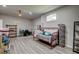 Finished basement with gray vinyl flooring, day bed and decor at 104 Antilles Cir, Charleston, SC 29492