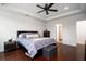A cozy bedroom with a queen bed, bedside tables, and recessed lighting for a relaxing ambiance at 104 Antilles Cir, Charleston, SC 29492