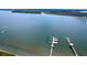 Aerial view showcasing waterfront with boat docks, beautiful water views, and calm waters at 108 Fairbanks Oak Aly # 401, Charleston, SC 29492