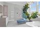 Luxurious bathroom boasting marble floors, glass shower with rainfall shower head, and a soaking tub at 108 Fairbanks Oak Aly # 401, Charleston, SC 29492