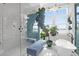 Stunning bathroom featuring marble floors, dual shower heads, stylish lighting and decor at 108 Fairbanks Oak Aly # 401, Charleston, SC 29492