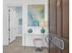 Charming entryway with console table, decor, and view of a bright hallway at 108 Fairbanks Oak Aly # 401, Charleston, SC 29492