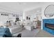 Open concept living area with kitchen, living, and dining space, with fireplace and comfortable seating at 108 Fairbanks Oak Aly # 401, Charleston, SC 29492