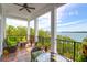 Relaxing porch with outdoor furniture and scenic views at 108 Fairbanks Oak Aly # 401, Charleston, SC 29492