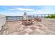 Inviting rooftop deck with wooden picnic tables offering views of the waterway and bridge at 108 Fairbanks Oak Aly # 401, Charleston, SC 29492