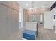Spacious walk-in closet featuring custom shelving, drawers and hardwood floors at 108 Fairbanks Oak Aly # 401, Charleston, SC 29492