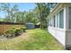 Well-maintained backyard featuring a storage shed and mature trees at 109 New Spring Ct, Summerville, SC 29485