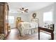 Comfortable bedroom with a large window, neutral walls and ceiling fan at 109 New Spring Ct, Summerville, SC 29485