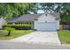Classic single Gathering home with a concrete driveway and an attached garage at 109 New Spring Ct, Summerville, SC 29485