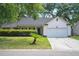 Charming single-story home with well-manicured lawn and attached two-car garage at 109 New Spring Ct, Summerville, SC 29485