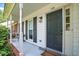 Close up of the front door area showcasing the pillars and outside wall lights at 109 New Spring Ct, Summerville, SC 29485