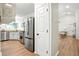 Well-lit kitchen featuring stainless steel appliances and granite countertops at 109 New Spring Ct, Summerville, SC 29485