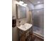 Bathroom featuring a stand-alone sink, gray shower and gray tiled walls at 111 Coltsgate Ct, Summerville, SC 29485