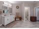 Spacious bathroom featuring double sinks, tile floors, and a separate toilet room at 111 Coltsgate Ct, Summerville, SC 29485